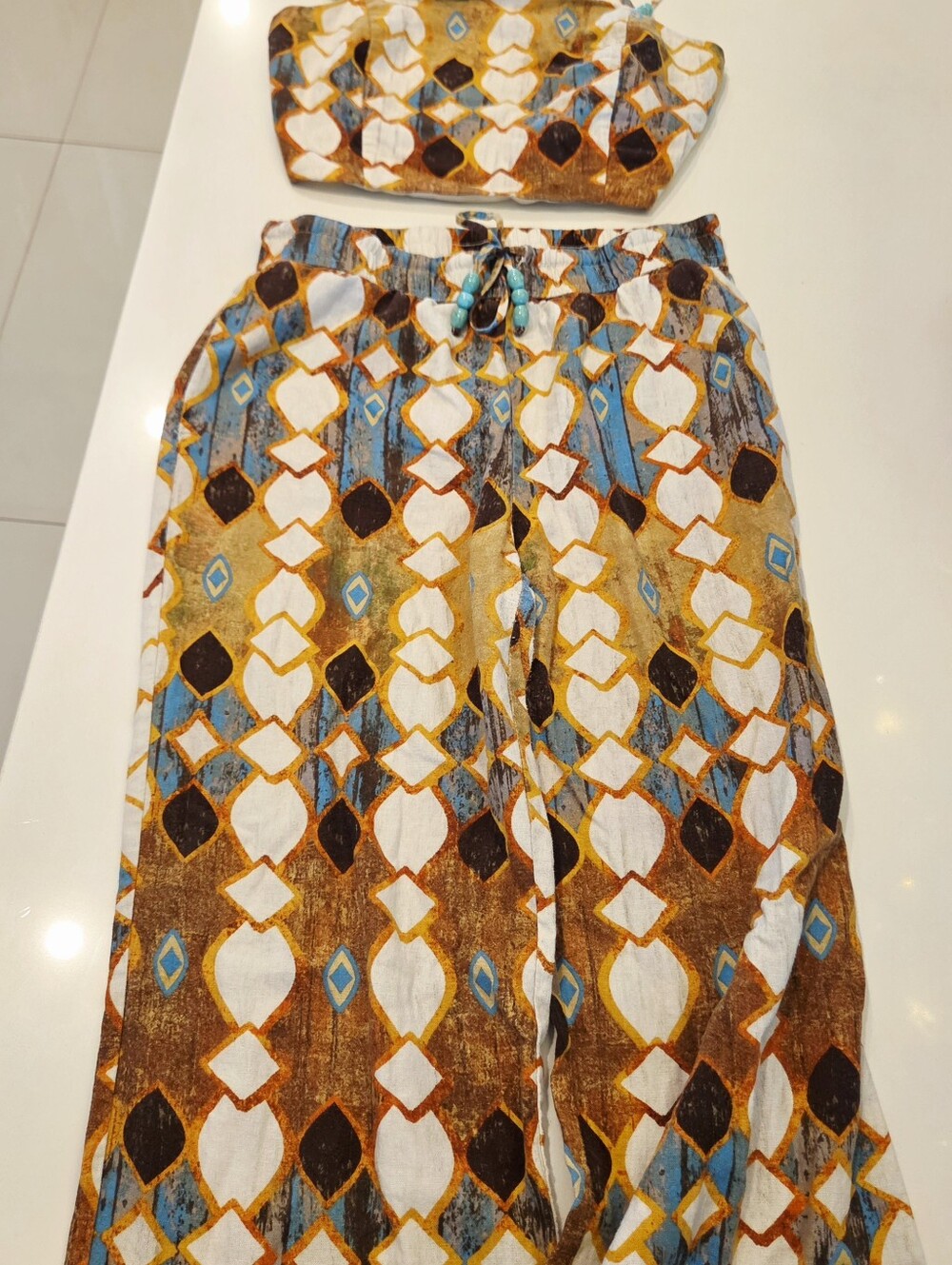 Joie Two-Piece Strapless Top & Wide-Leg Pants in White, Blue, Brown, Gold